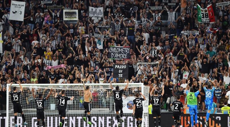 A Juventus Ultra shouts down his megaphone during the Serie A match at  Allianz Stadium, Turin.