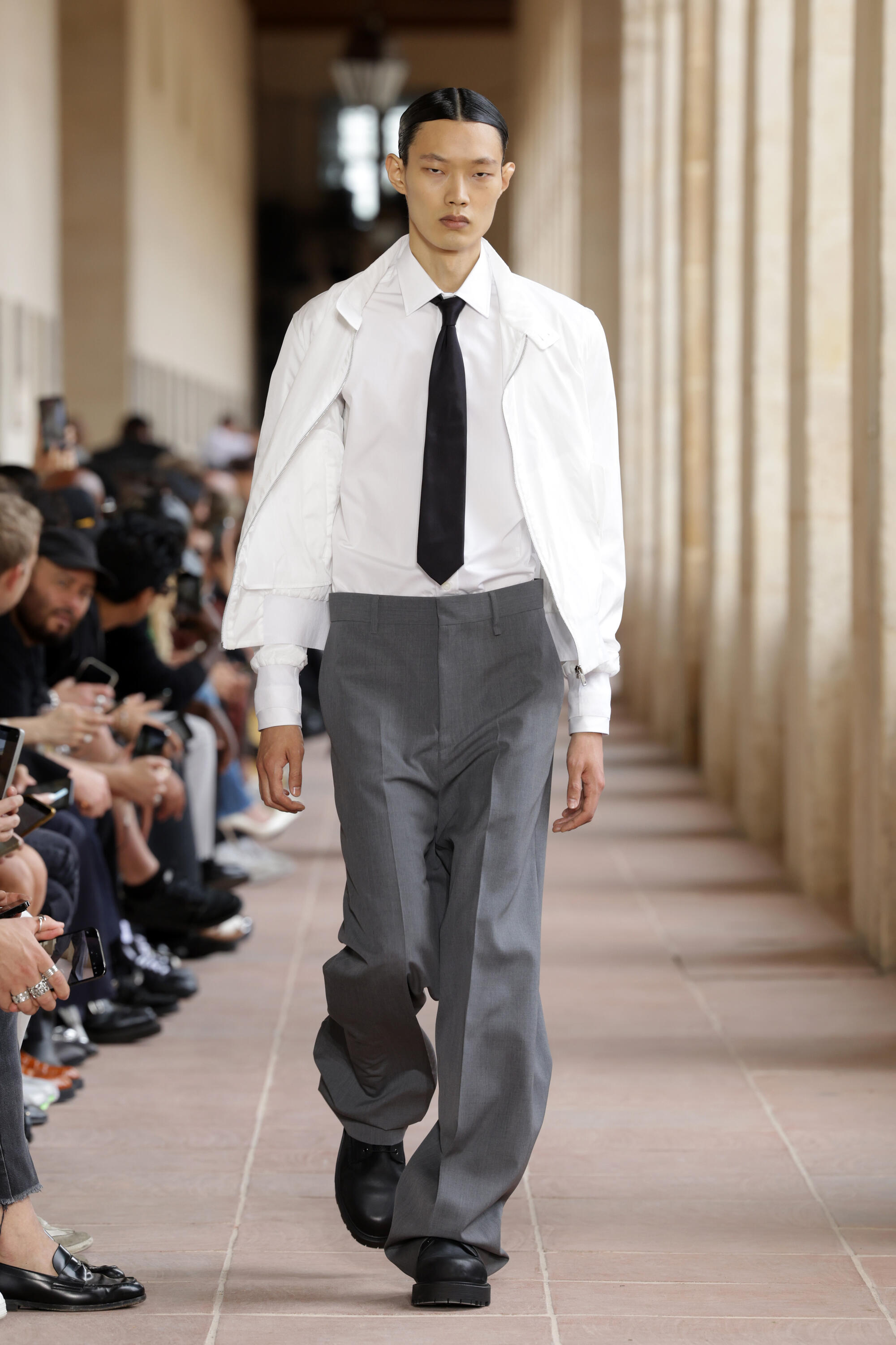 A model wears a creation by Kim Jones as part of Louis Vuitton Men's  fashion Spring Summer 2012 collection presented during the Paris Men's  Fashion Week, in Paris, France, June 23, 2011.
