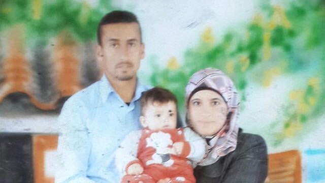 Father Saed, mother Reham and baby Ali (Photo: Hassan Shaalan)