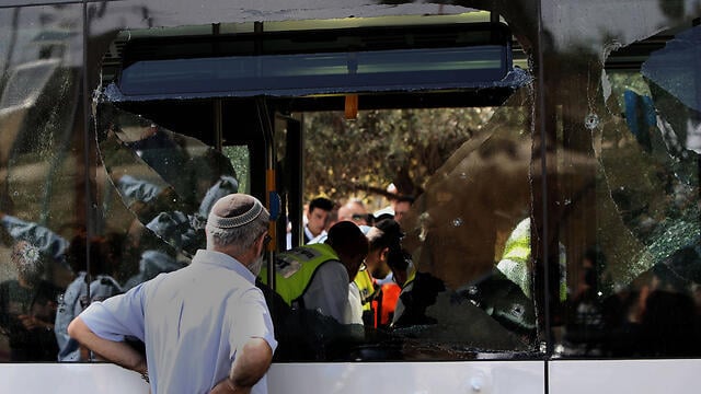 Aftermath of 2015 bus shooting in Jerusalem (Photo: AFP) (צילום: AFP) Aftermath of 2015 bus shooting in Jerusalem (Photo: AFP)