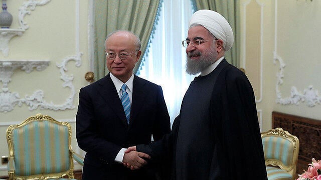 Amano and Hassan Rouhani