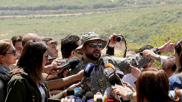 Hezbollah officer speaking to the press (Photo: EPA)