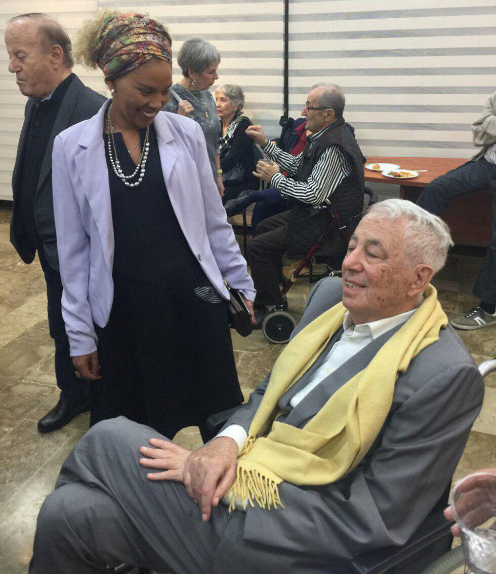 Georges Gutelman meeting one of the people he helped evacuate from Ethiopia 