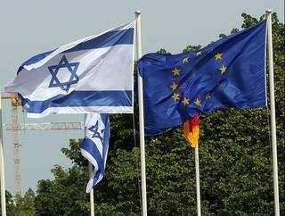 The flags of Israel and the EU fly together (Photo: AFP) The flags of Israel and the EU fly together