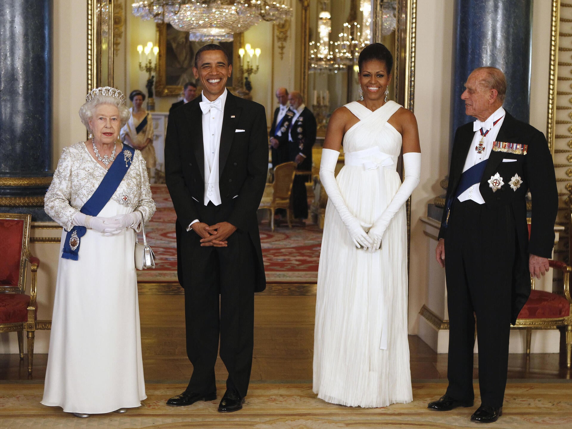מישל אובמה בעיצוב של טום פורד, 2011 (צילום: Larry Downing/Pool photo via AP, file) מישל אובמה בעיצוב של טום פורד, 2011
