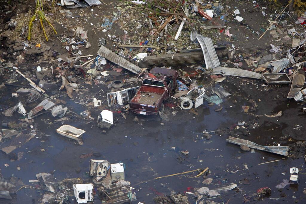 The damage from the 2009 earthquake in American Samoa (Photo: AP) נזקי רעידת האדמה שפקדה את סמואה האמריקנית בשנת 2009