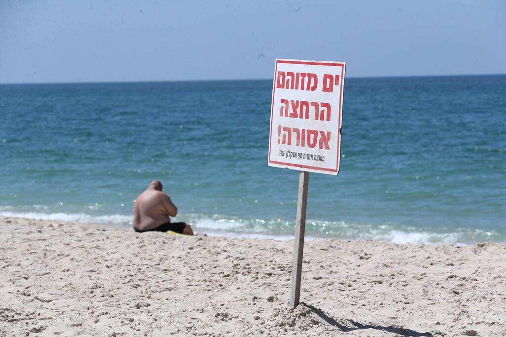 שלט בחוף זיקים. ארכיון (צילום: גדי קבלו) חוף זיקים, השבוע