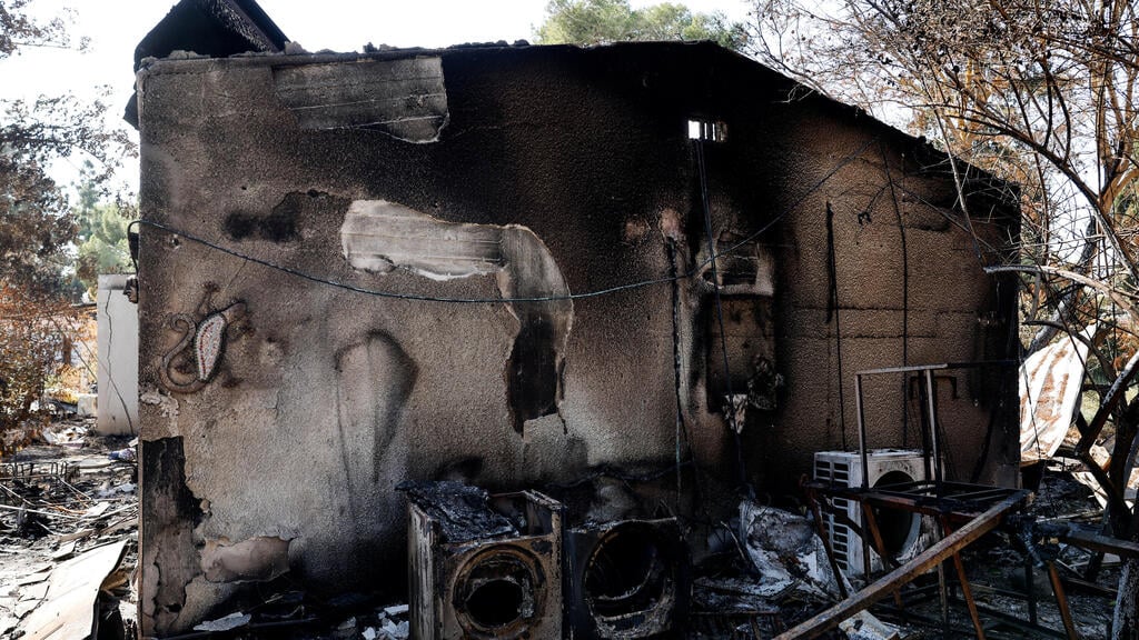 Damages in Kibbutz Nir Oz following Hamas' attack (Photo: REUTERS/Amir Cohen) קיבוץ ניר עוז