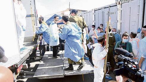 Soldiers who identified Israel’s war dead say they were left without mental...