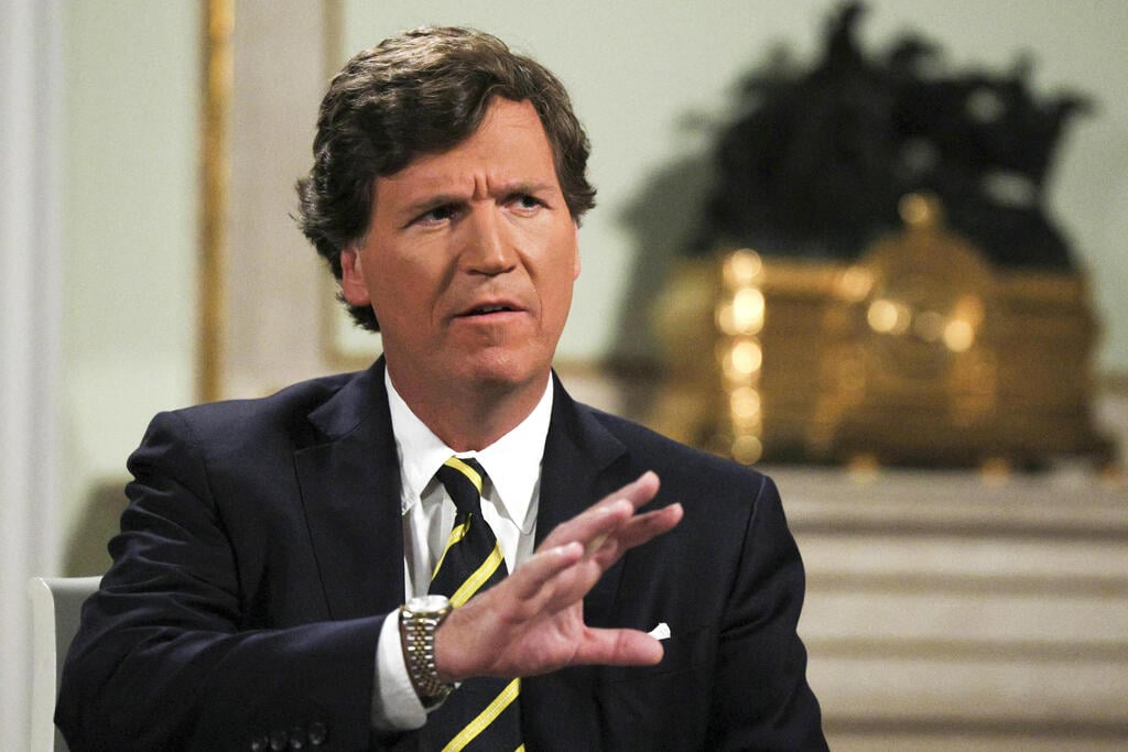 Tucker Carlson (Photo: Gavriil Grigorov, Sputnik, Kremlin Pool Photo via AP) נשיא רוסיה ולדימיר פוטין ב ריאיון ל טאקר קרלסון