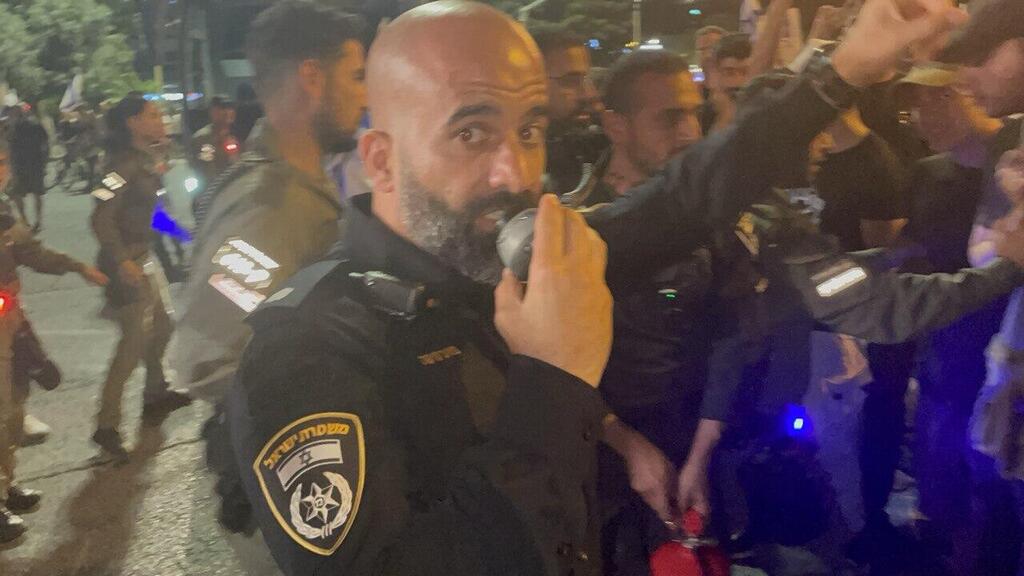 רפ"ק מאיר סוויסה בהפגנה (צילום: מאיר תורג'מן) רפ"ק מאיר סויסה