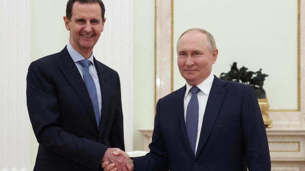 Photo: Sputnik/Valeriy Sharifulin/Pool via REUTERS נשיא סוריה בשאר אסד נשיא רוסיה ולדימיר פוטין ביקור מוסקבה