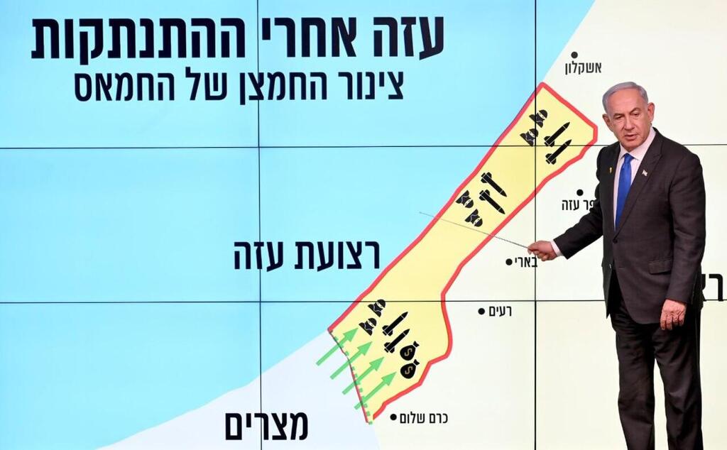 נאום נתניהו על חשיבות ציר פילדלפי, 2 בספטמבר (צילום: אבי אוחיון, לע״מ) בנימין נתניהו עם המצגת מפת ציר פילדלפי