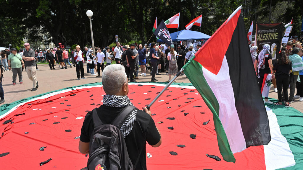 Pro-Palestinian rally in Australia (Photo: AAP/Mick Tsikas / REUTERS ) מחאות פרו-פלסטיניות בסידני, אוסטרליה