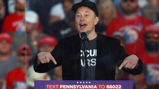 Elon Musk at a Trump rally last month 