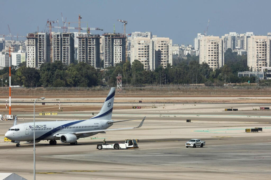 מטוס אל על בנתב"ג (צילום: GIL COHEN-MAGEN / AFP) נתב"ג