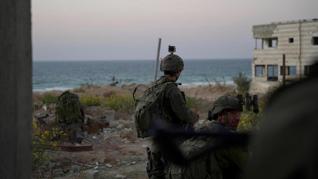 IDF reserve troops in Gaza (Photo: IDF Spokesperson's Unit) אוגדת המילואים 252 סיימה את משימתה במרכז רצועת עזה ומעבירה בטקס קרבי את הפיקוד על הגזרה לאוגדה 99