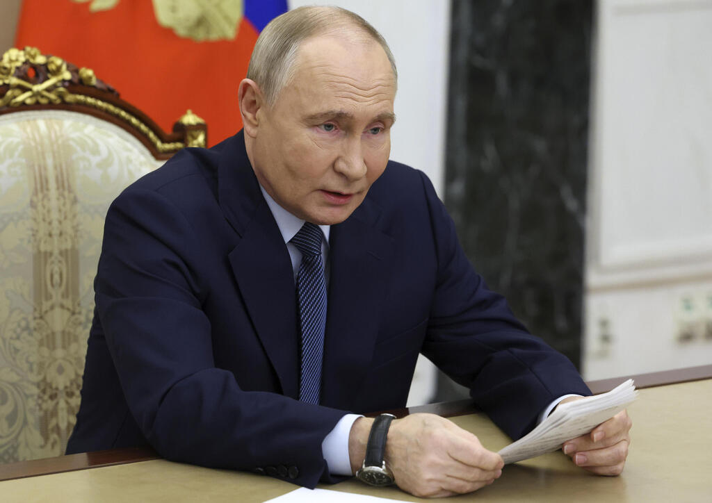 ולדמיר פוטין (צילום: Vyacheslav Prokofyev, Sputnik, Kremlin Pool Photo via AP ) ולדמיר פוטין