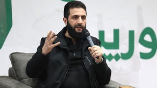 אבו מוחמד אל ג'ולני מנהיג הייאת תחריר א שאם סוריה מורדים נגד משטר אסד נפל דמשק