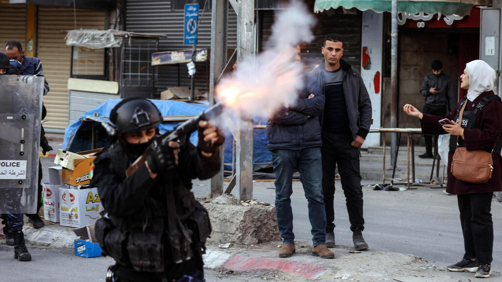 צילום: JAAFAR ASHTIYEH / AFP כוחות ביטחון פלסטינים בג'נין