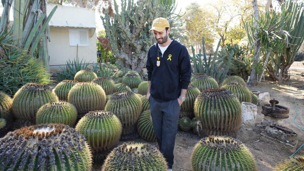     Oded Lifshitz's unusual cactus garden in Nir Oz, visited by his grandson