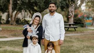 Moshe Barsheshet with his family at Kibbutz Holit 