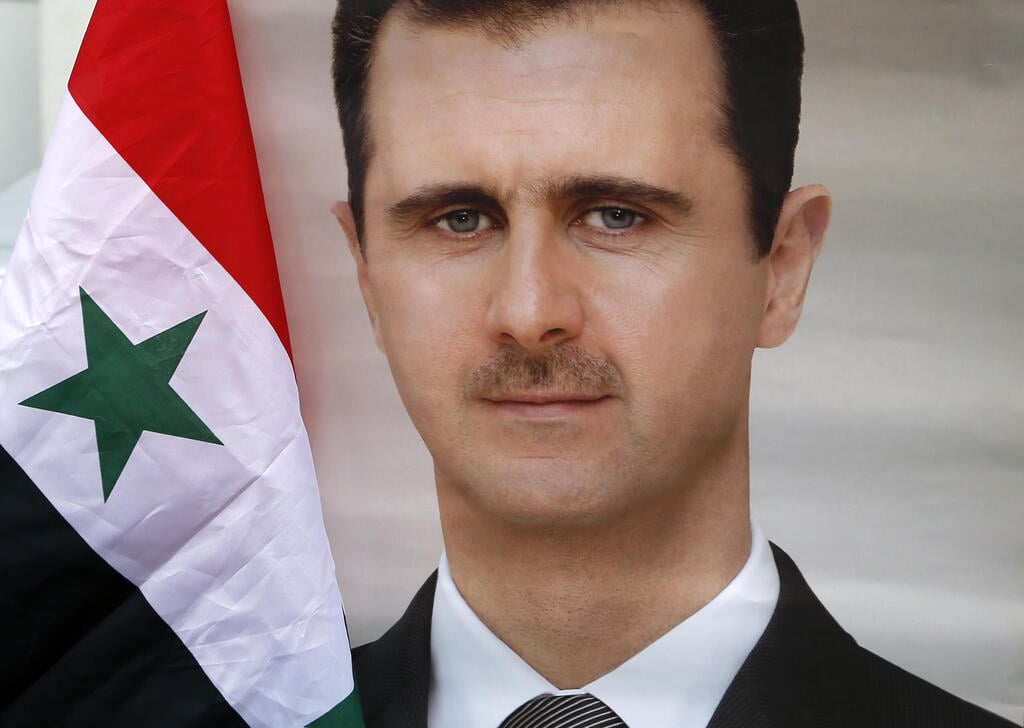 Bashar Assad (Photo: Darko Vojinovic/AP) בשאר אסד