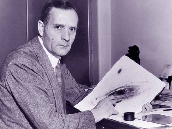 A variable star that reshaped our view of the universe. Hubble holding a photograph of the Andromeda Galaxy (Photo: Science Photo Library) A variable star that reshaped our view of the universe. Hubble holding a photograph of the Andromeda Galaxy
