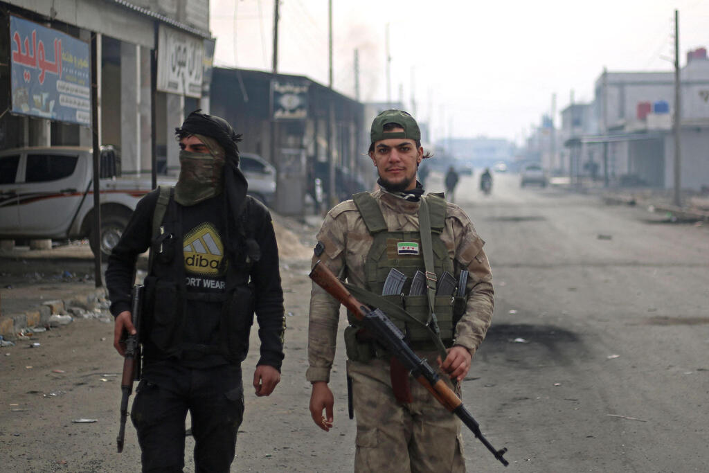 Turkish-backed fighters in Syria (Photo: AFP) מנבג'