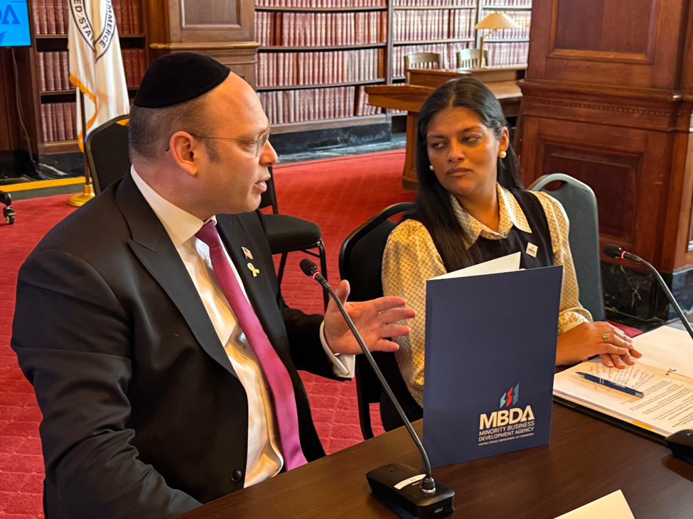 Duvi Honig discussing the MOU with incoming undersecretary of US Department of Commerce Madiha Latif (Photo: Orthodox Jewish Chamber of Commerce) Duvi Honig discussing the MOU with incoming undersecretary of US Department of Commerce Madiha Latif