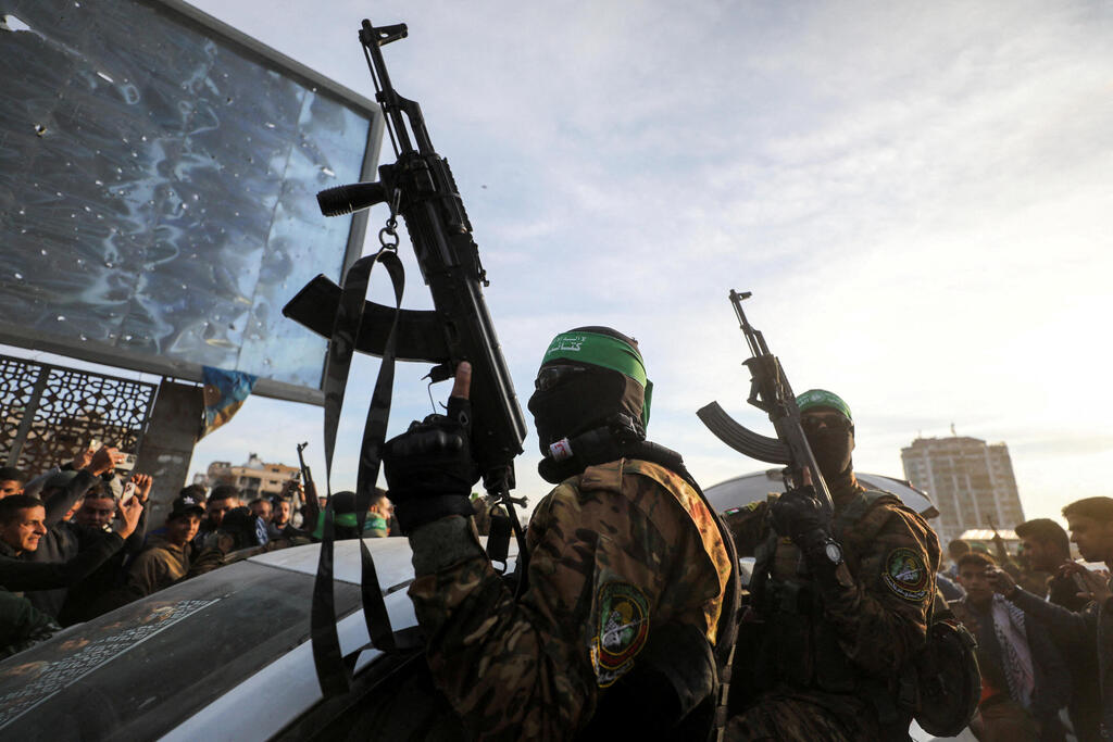 Israeli officials say Hamas has accepted complete disarmament as part of an emerging agreement in Cairo talks; roadmap includes strict dismantling of weapons and authority transfer to NCAG