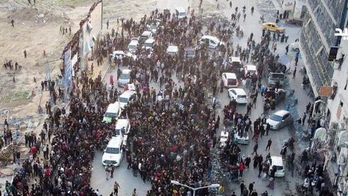 'This sends a message': The chaos at Gaza's central square as hostages were released