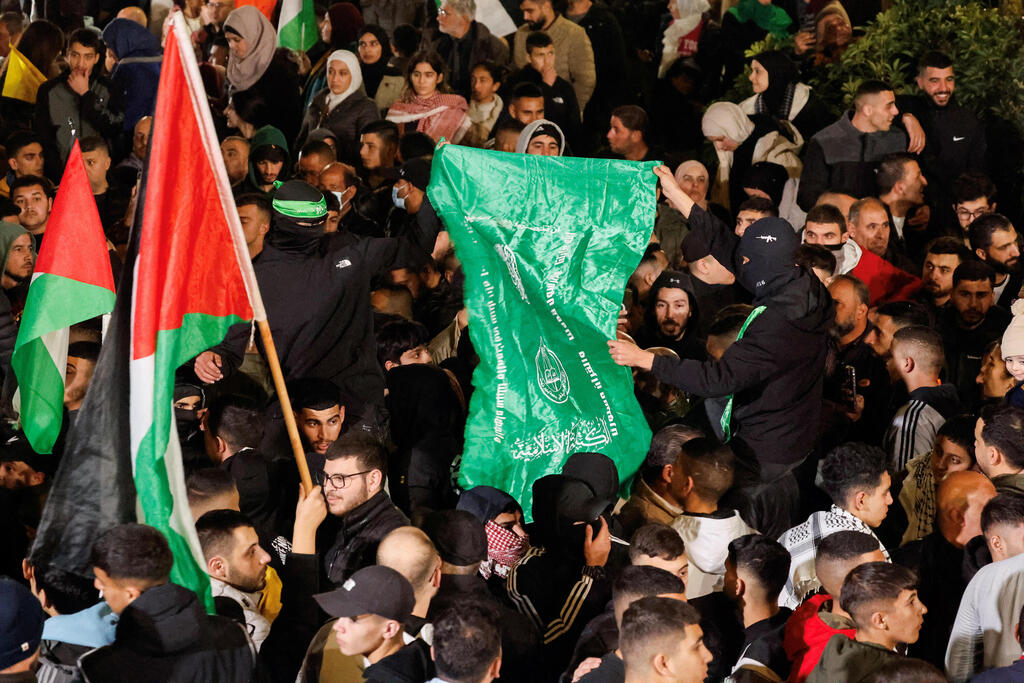 צילום: REUTERS/Raneen Sawafta חגיגות ב רמאללה שחרור מחבל מחבלים ב עסקת החטופים עסקה ב חגיגות ב רמאללה