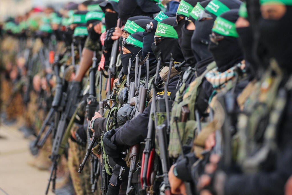Hamas terrorists in Gaza (Photo: Eyad Baba/ AFP) שחרור חטופים - פעימה חמישית