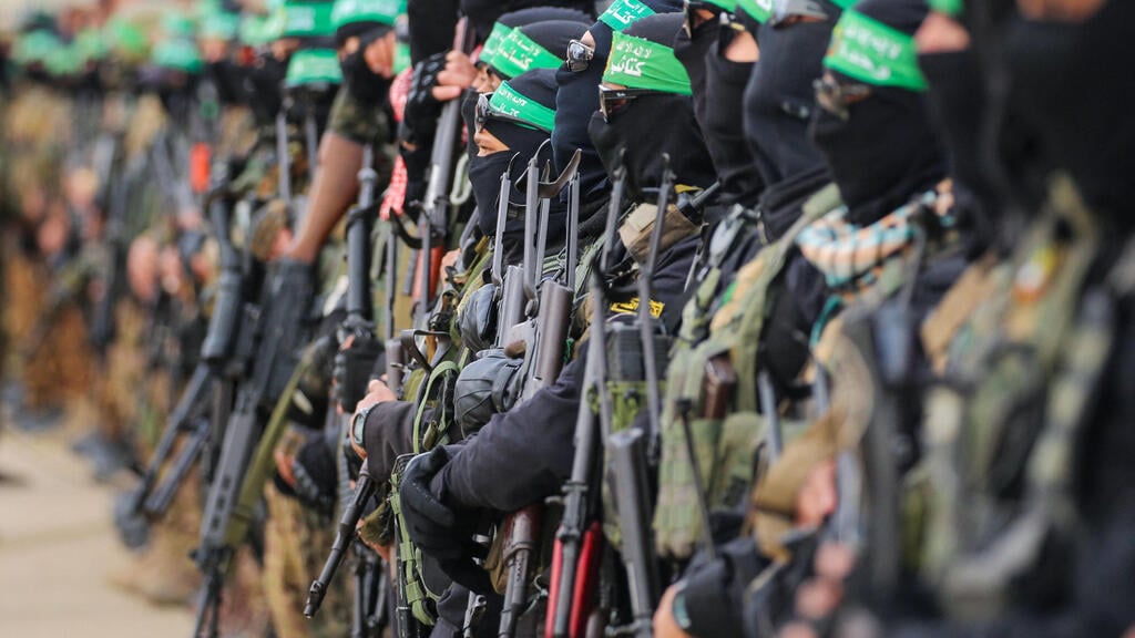 Hamas terrorists during the hostage release on Saturday (Photo: Eyad Baba / AFP) שחרור חטופים - פעימה חמישית