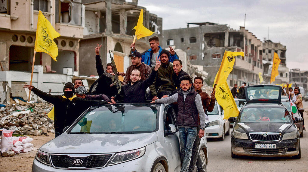 קבלת פנים של הפתח למחבלים, אתמול בחאן־יונס | צילום: EYAD BABA, אי־אף־פי yk14252594