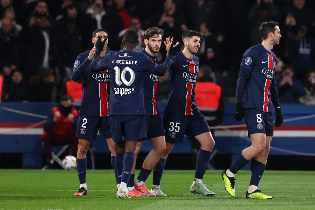 Paris Saint-Germain (Photo: Franck FIFE / AFP) שחקני פריז סן ז'רמן חוגגים