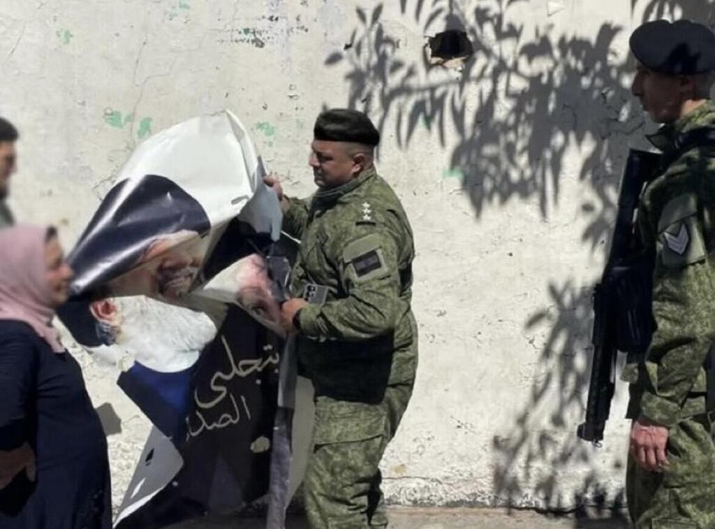 Lebanese army soldiers removing posters from Beirut featuring slain Hezbollah leaders (Photo: X) Lebanese army soldiers removing posters from Beirut featuring slain Hezbollah leaders