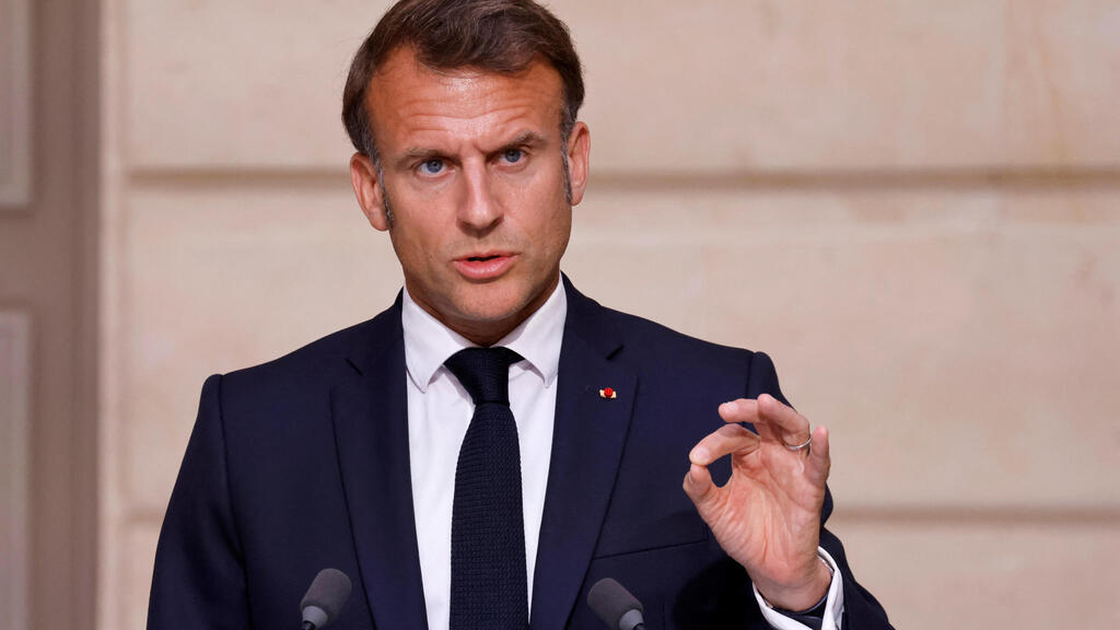 Emmanuel Macron (Photo: Ludovic Marin / Reuters) מסיבת עיתונאים בין נשיא צרפת לקנצלר של גרמניה