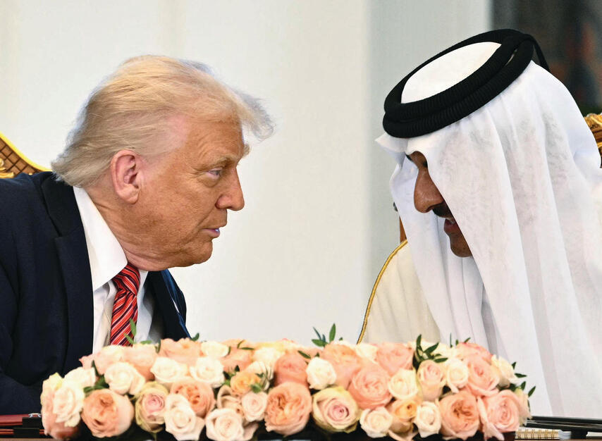 "אנחנו פשוט אוהבים אחד את השני". הפגישה עם אמיר קטאר | צילום: BRENDAN SMIALOWSKI , אי־אף־פי yk14369439