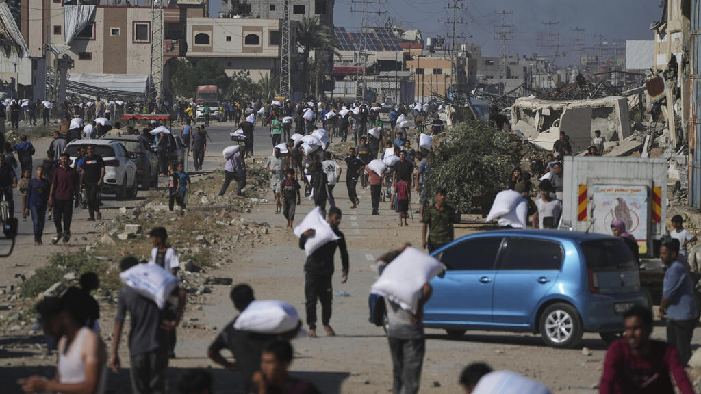Photo: AP Photo/Abdel Kareem Hana א-זוואידה