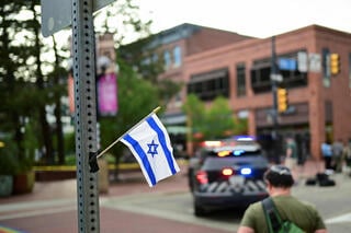 An Israeli flag at the scene of an attack targeting pro-Israel demonstrators in Bourlder, Colorado 