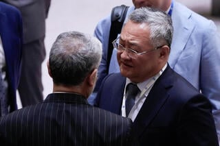 China's permanent representative to the UN Fu Cong, talks to Iran Ambassador Amir Saeid Iravani 