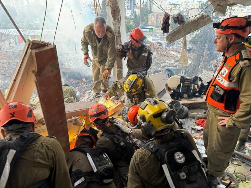 כוחות פיקוד העורף ב"עם כלביא". "לפני זה לא היו לנו אירועים מקומיים להתבסס עליהם. זה השתנה" (צילום: דובר צה"ל) כוחות פיקוד העורף פועלים בזירות הנפילה ברחבי הארץ