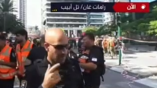 אל ג׳זירה שוטר מבקש להפסיק השידור