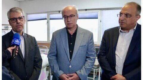 Dr. Homayoun Sameh (center)