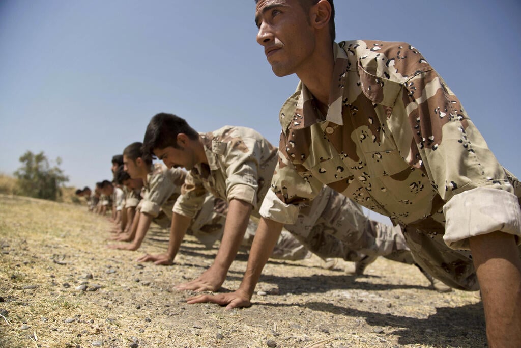 Iranian Kurdish fighters (Photo: AP Photo/Maya Alleruzzo) לוחמים כורדים איראנים