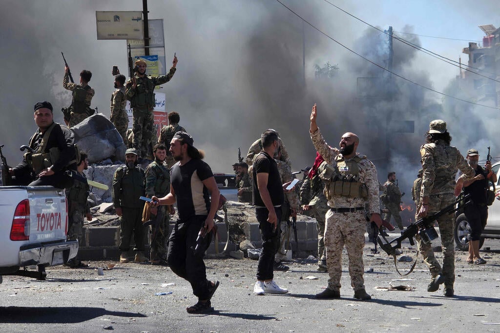 Syrian regime forces entering Sweida province (Photo: Sam HARIRI / AFP) כוחות המשטר הסורי נכנסים למחוז א-סווידא ב סוריה