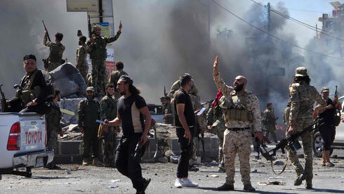 Syria's Kurds watch Druze massacre with alarm