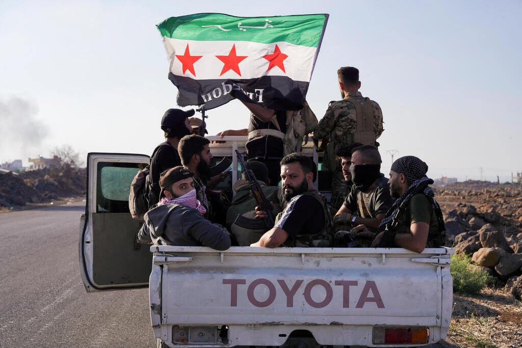 Photo: REUTERS/Karam al-Masri כוחות המשטר הסורי נכנסים למחוז א-סווידא ב סוריה